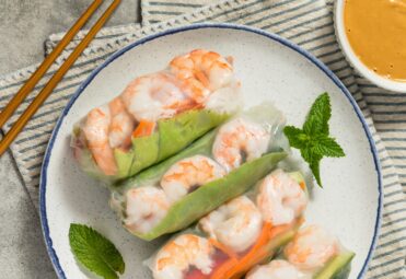 Homemade Vietnamese Shrimp Spring Rolls with Lettuce and Vegetables
